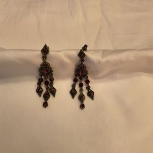 Hanging Pierced Earrings with Burgundy Colored Stones.